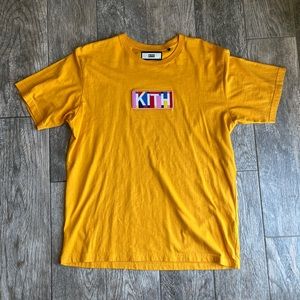 Kith Geo tee in deep yellow with bright logo. Great condition!